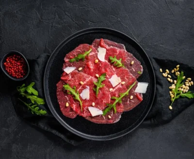 beef carpaccio with parmesan and arugula